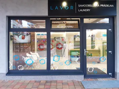 a store front with a display window of a store at British Quarter Apartments in Prague