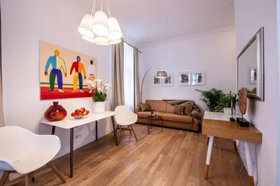 a living room with a couch and a table at Modern Downtown APT - renovated, on ideal location in Prague