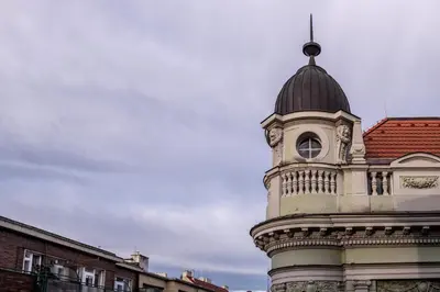 a building with a clock tower on top of it at Modern Downtown APT - renovated, on ideal location in Prague