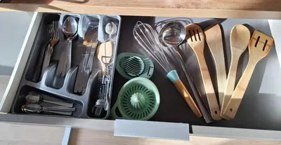 a drawer filled with lots of utensils at Garden House in Roudnice nad Labem
