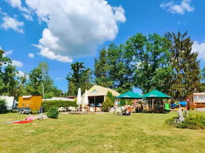 a park with a group of buildings and trees at Chata Slapy - Ždáň in Slapy