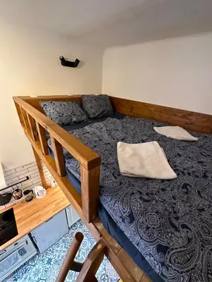 a bedroom with a bunk bed in a room at Cozy New Loft Apartment in Prague