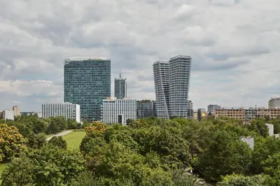 a city skyline with tall buildings in the background at Spacious Condo in Nusle by Prague Days in Prague