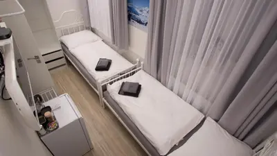 an overhead view of two beds in a room at Apartment CONTINENTS nearby Main Train and Bus Station in Prague