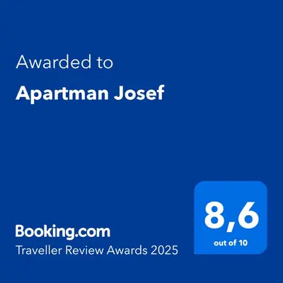a blue text box with the text awarded to an apartment loser at Apartman Josef in Prague
