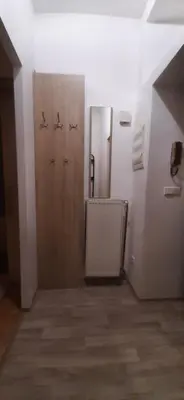 a hallway with two doors in a room at Apartman Josef in Prague