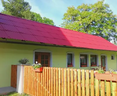 a small green house with a red roof at Domeček u Josefa in Mělník