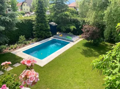 an overhead view of a swimming pool in a yard at Spacious villa with an outdoor pool in Černošice in Černošice