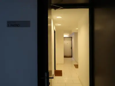 an open door to a hallway with a hallway leading into a room at Michal apartment 125m2 city centre in Prague
