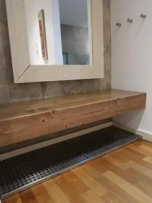a bathroom with a wooden bench with a mirror at Michal apartment 125m2 city centre in Prague