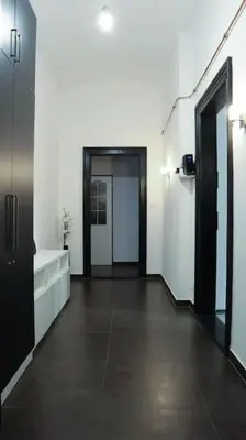 an empty room with a hallway with two doors at Modern Apartment in the Center of Prague in Prague