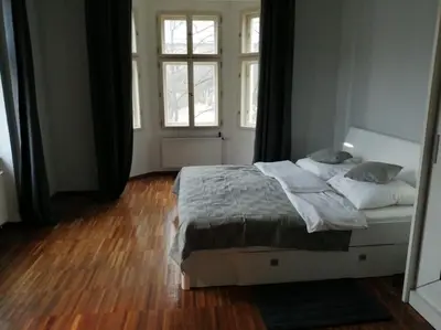 a bedroom with a bed with two pillows on it at 2 Bedrooms close Vyšehrad - Congress centrum in Prague