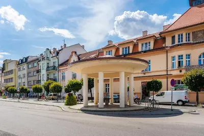 a gazebo in the middle of a city street at Apartmán Riegrovo náměstí in Poděbrady