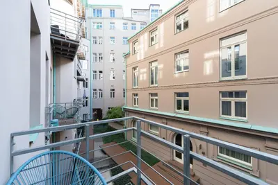 a balcony with a blue tennis racket on it at Prague Spirit in Prague