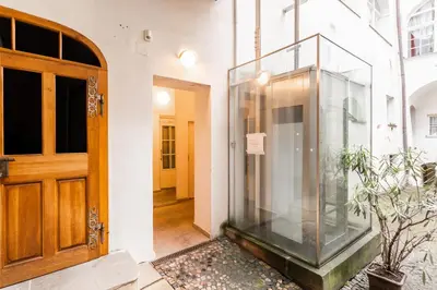 a glass case on the side of a building at Charming Apartment in Lesser Town in Prague
