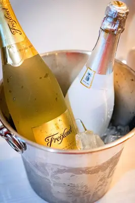 two bottles of champagne in a metal bucket at Imperial Deluxe Suite in Prague