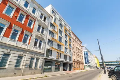 a row of buildings on a city street at Brand new studio apartment #62 with free secure parking in the center in Prague