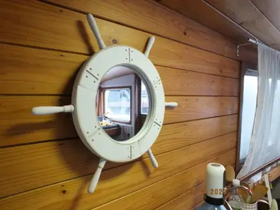 a mirror on the wall of a room at Zouw Hausboat Zakotven -pouze ubytovaní in Roudnice nad Labem
