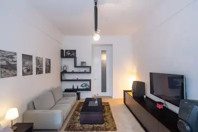 a bathroom with a shower with a glass door at Luxury Apartment on Old Town Square in Prague