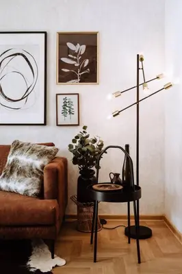 a living room with a couch and a table at Loft apartment with balcony in centre in Prague