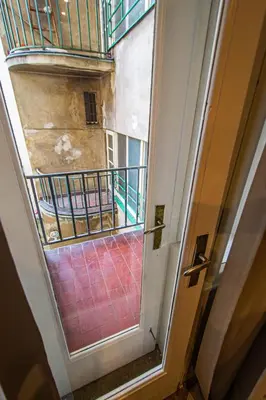 an overhead view of a stairway in a building at Cozy studio in the main city center in Prague