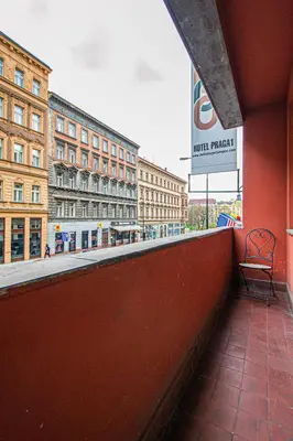 a bench sitting on the side of a building at Cozy studio in the main city center in Prague