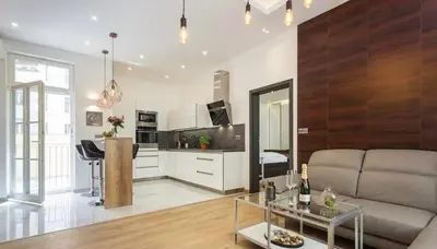a living room with a couch and a table at Luxury Apartment on Wenceslas Square in Prague