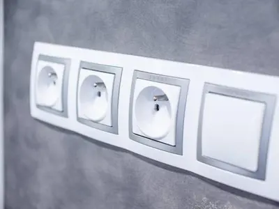 a row of light switches on a wall at Top class apartment in old town 2 bedrooms in Prague