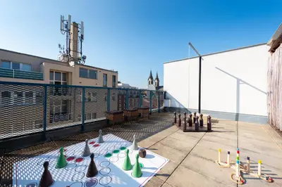 a skateboard on the roof of a building at Stylish penthouses featuring a terrace in Prague in Prague