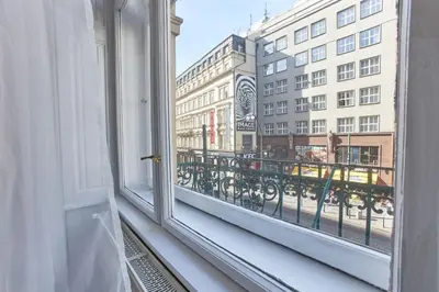 a window with a view of a city street at Narodni - Old Town Residence in Prague