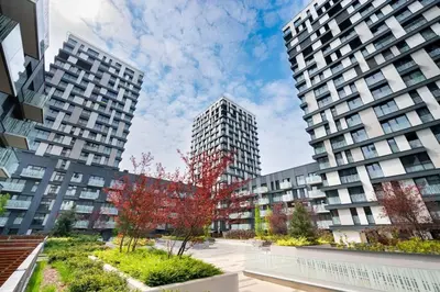 a view of two tall buildings in a city at Centrum Park Studio in Prague