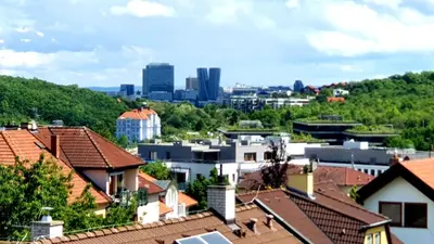 a view of the city from the roofs of houses at LUXURY APARTMENT VBLOKU in Prague
