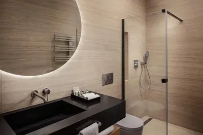 a bathroom with a sink and a shower at Soukenicka Apartments Old Town Prague in Prague