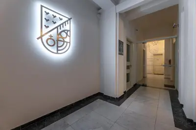 a hallway with a sign on a wall at Luxurious, charming studio perfect for couples in Prague